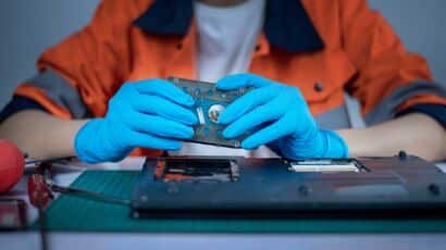 Technician creating a forensic image of a hard drive at a digital forensics lab in Mississauga