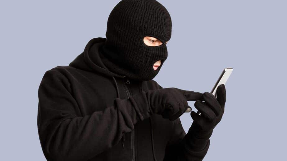 Certified examiner checking a smartphone for signs your phone is hacked at a Mississauga forensics lab