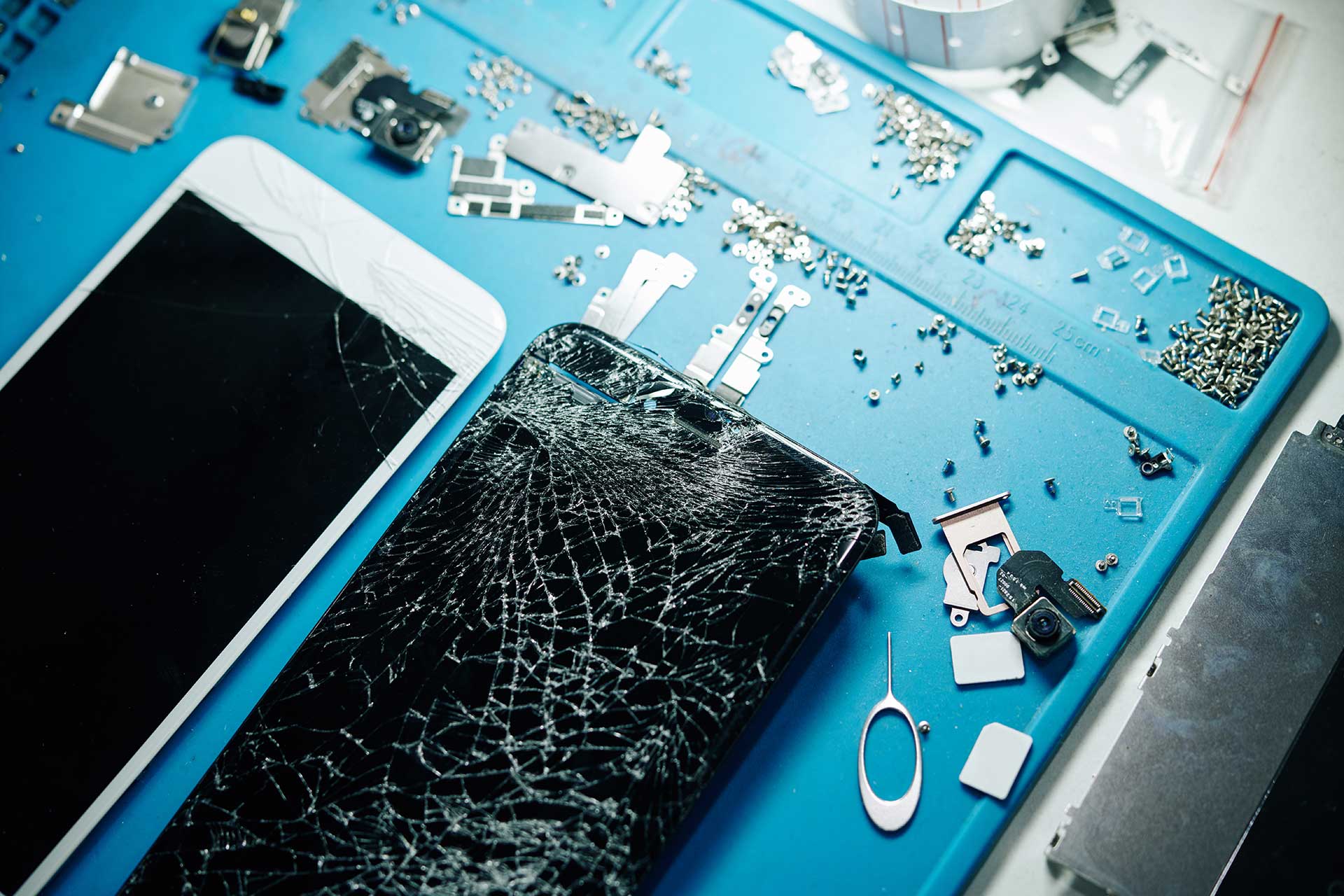 Dead iPhone data recovery: an iPhone logic board under a microscope at a GTA lab