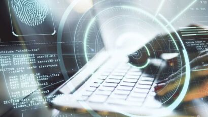 Forensic examiner imaging a laptop after a cyber attack, showing digital forensics vs cybersecurity in practice